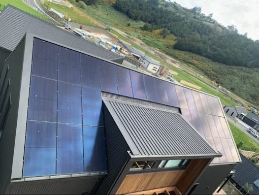 Full-black solar panels fitted to a custom roof by Energon